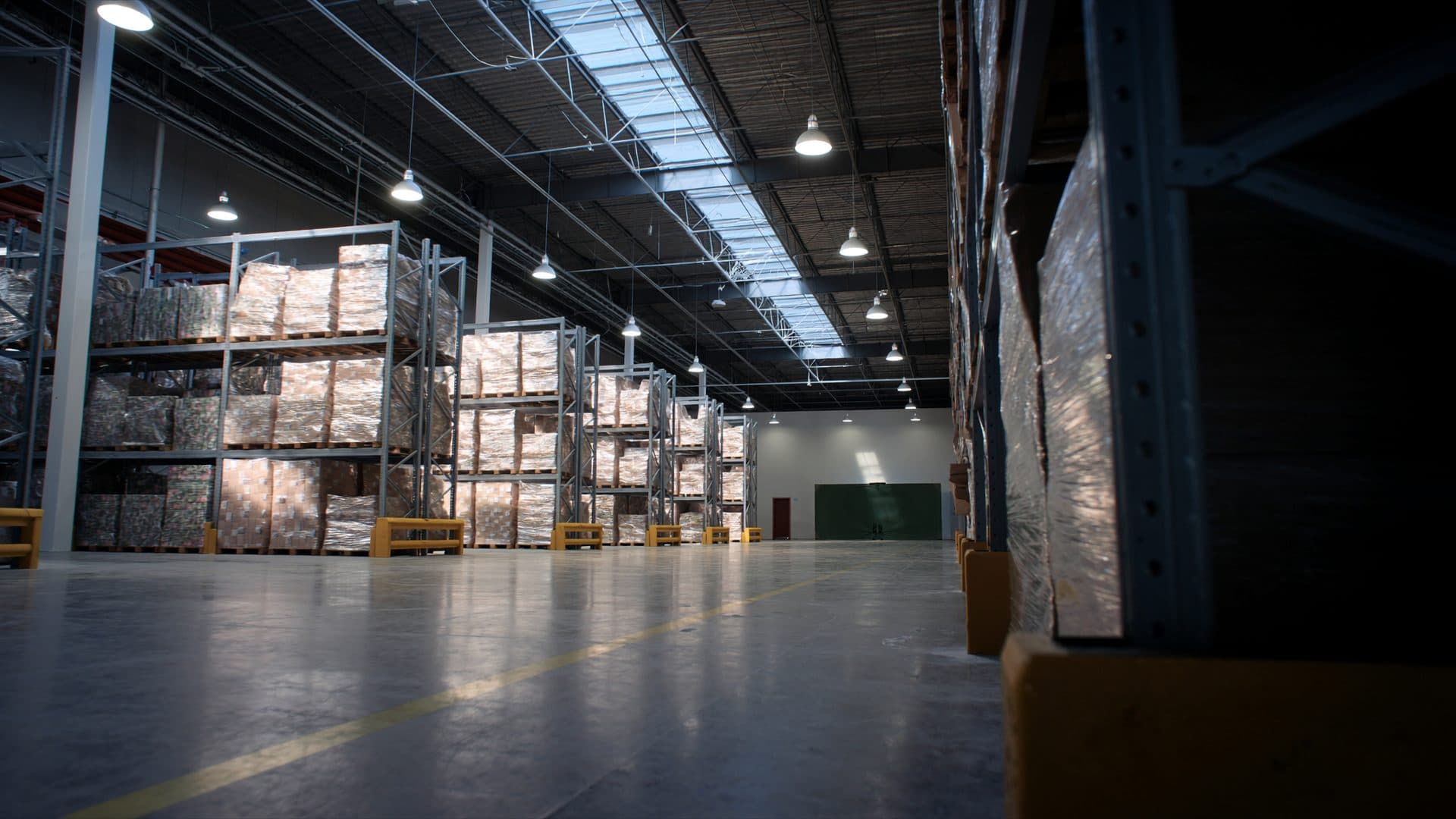 Illustrative: a modern distribution warehouse with tall racking
